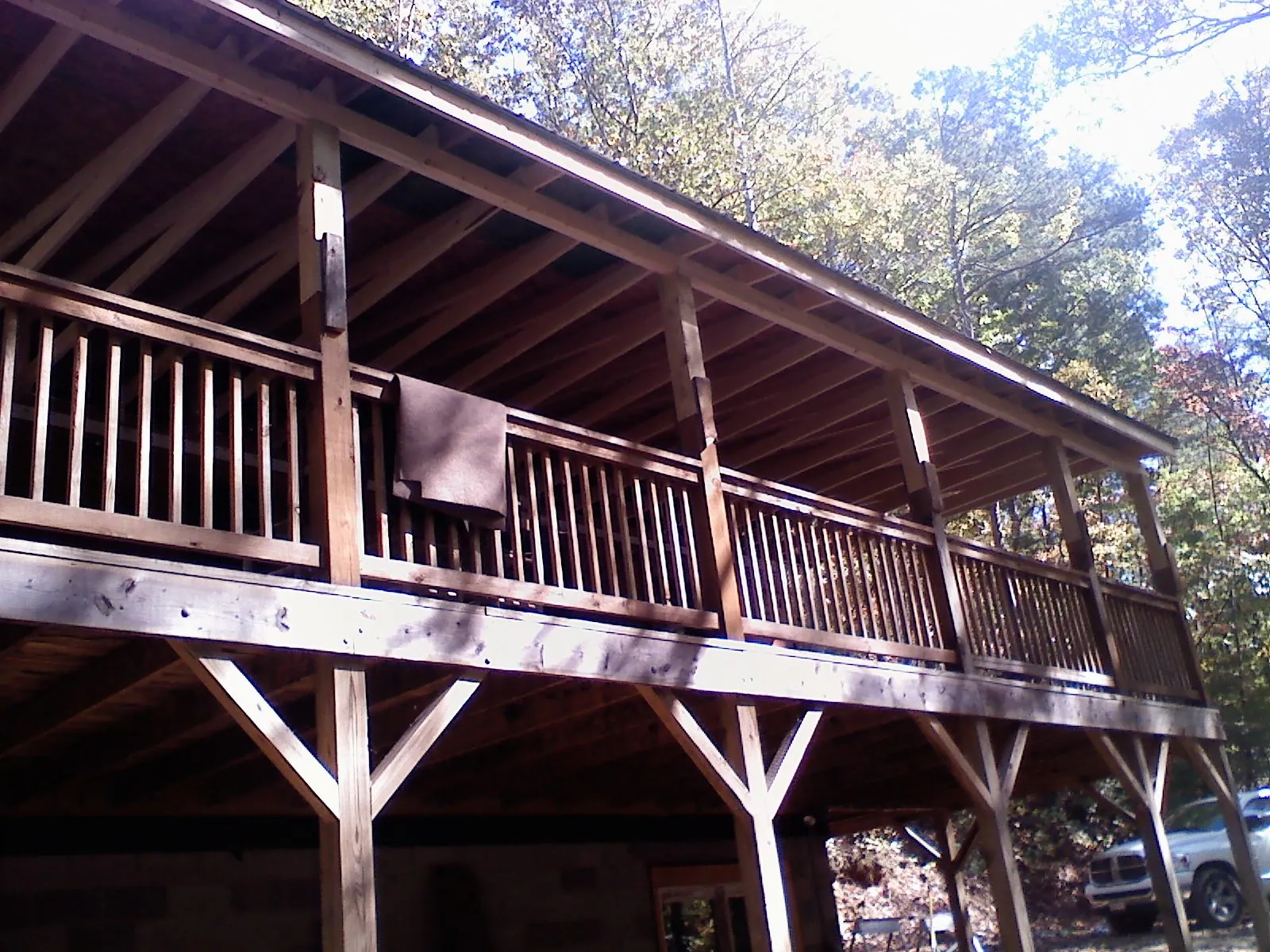 Timber framing under a new elevated porch and deck — Roof Leak Repair in Greenfield Park by Roofing Brothers